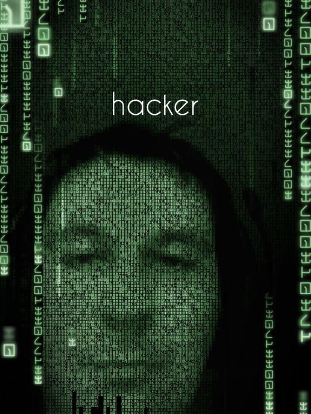 Das Gesicht eines Hackers auf einem Computermonitor umgeben von Binärcode und dem Wort "Hacker."