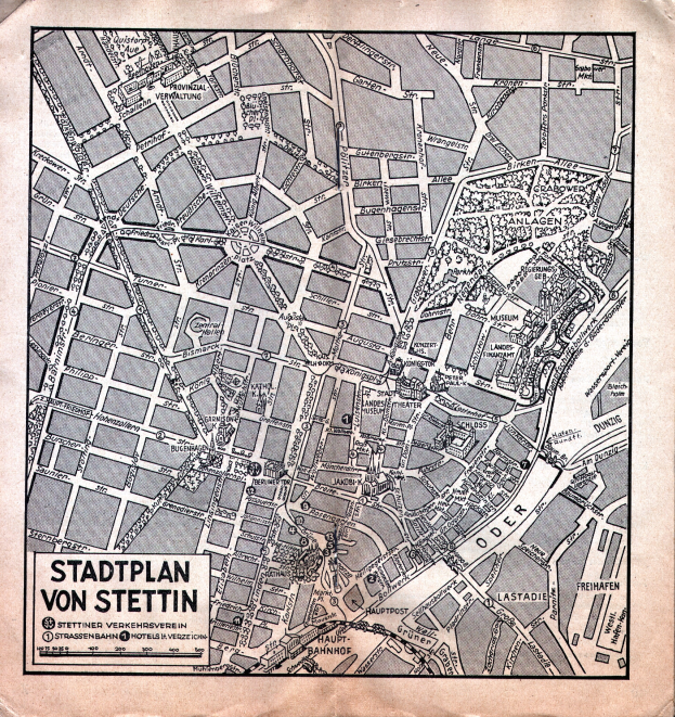Ein detaillierter alter Stadtplan von Stuttgart auf Papier, der Straßen, Gebäude und Sehenswürdigkeiten zeigt, mit zusätzlichem Text.